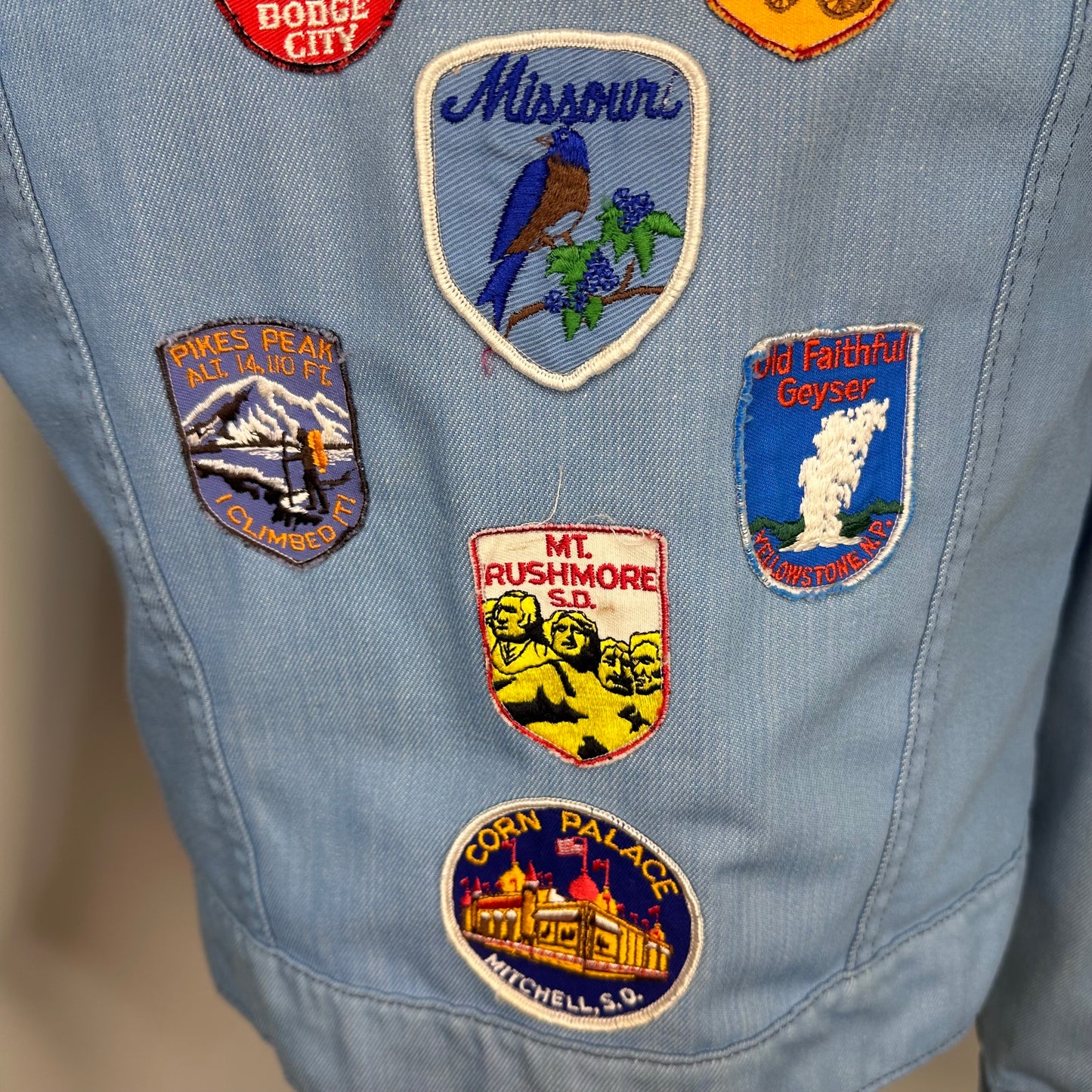 1970s Light Blue Denim Jacket with lots of added Patches, Youth XL/Adult S