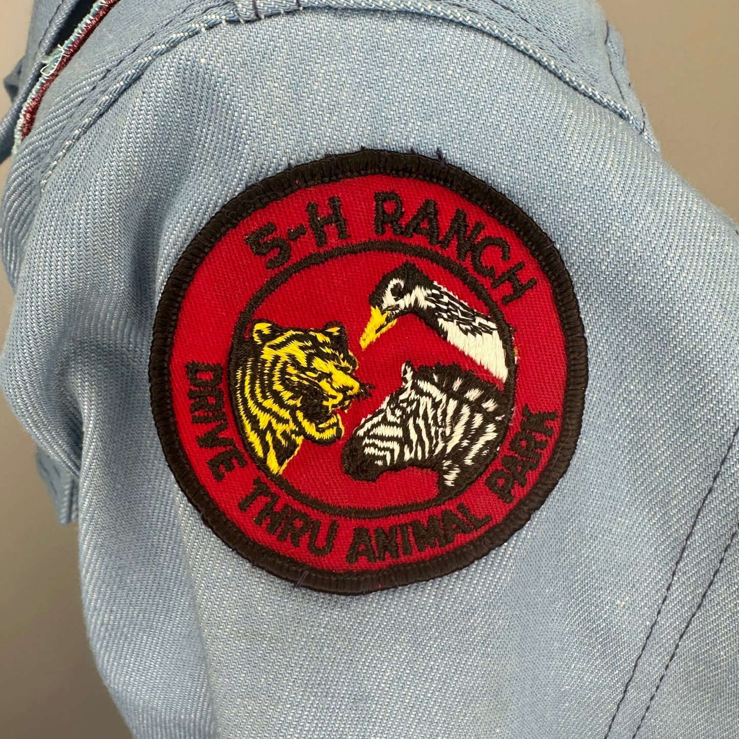 1970s Light Blue Denim Jacket with lots of added Patches, Youth XL/Adult S