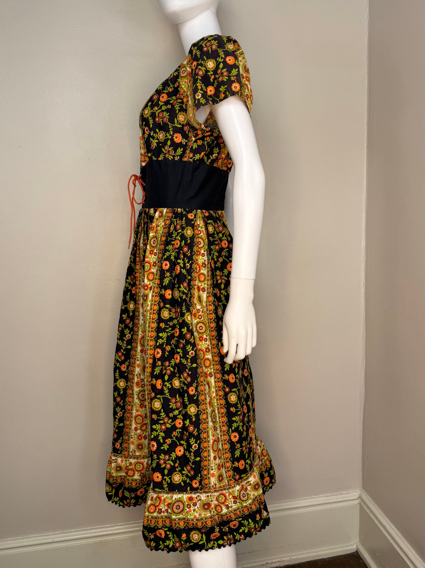 1960s Black and Orange Floral Peasant Dress with Corset Waist, Carol Brent Size Small-Medium, Montgomery Ward