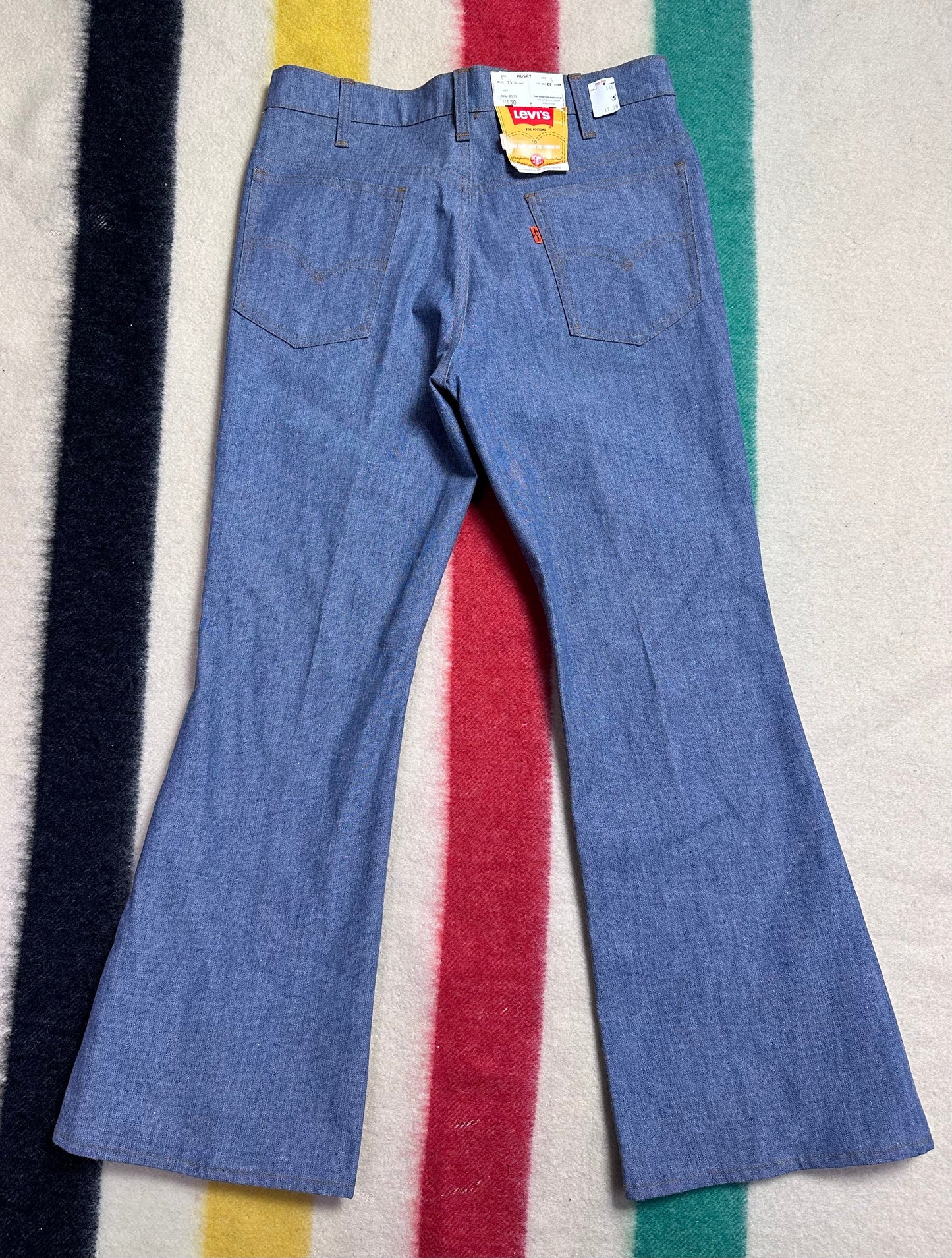 1970s Levi’s 946 Bell bottom Blue Jeans, 33"x29", Deadstock with Tags