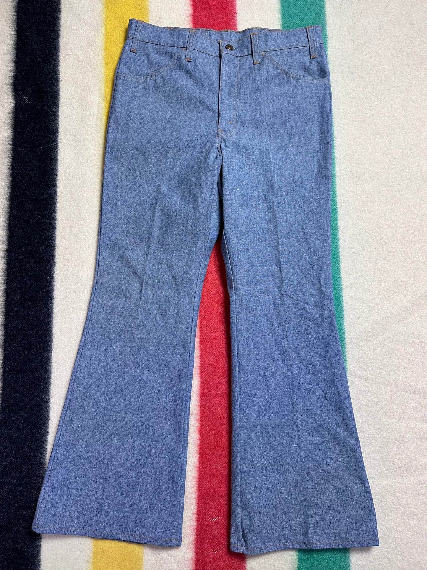 1970s Levi’s 946 Bell bottom Blue Jeans, 33"x29", Deadstock with Tags